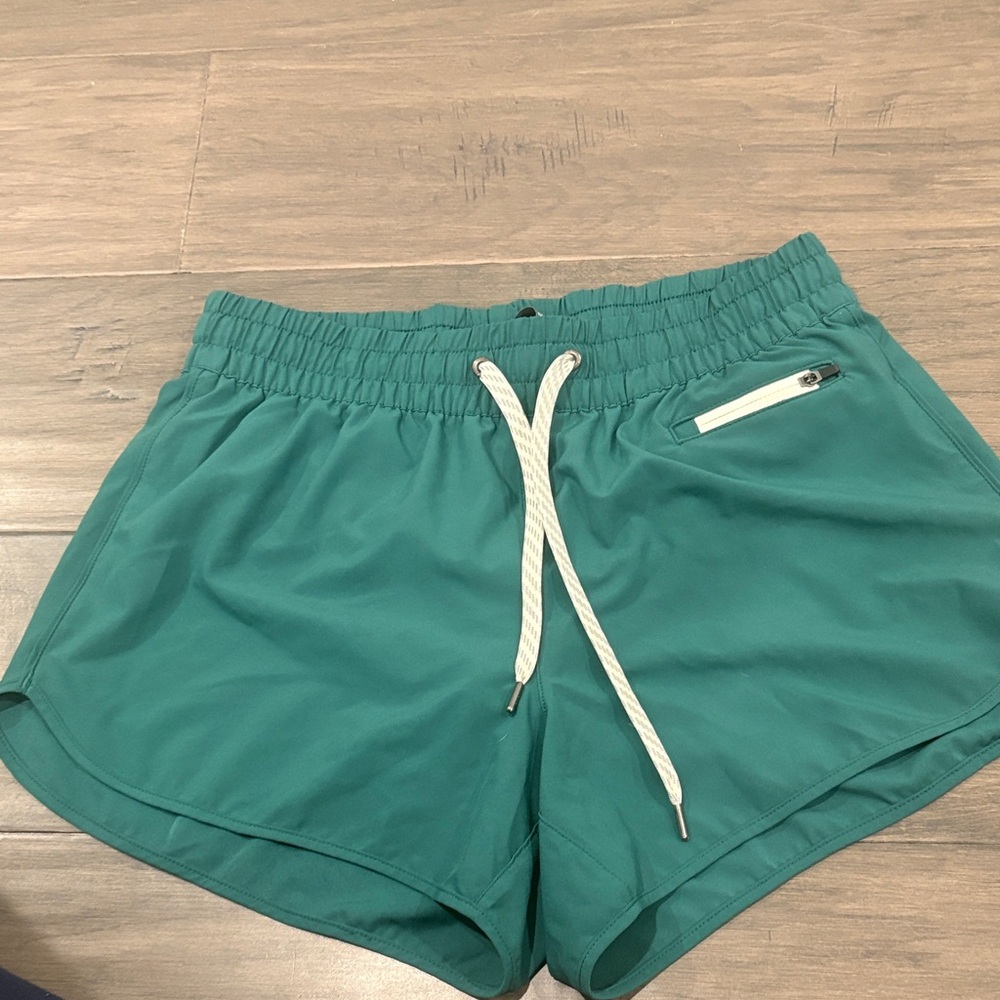 Vuori Teal Athletic Shorts with White Accents